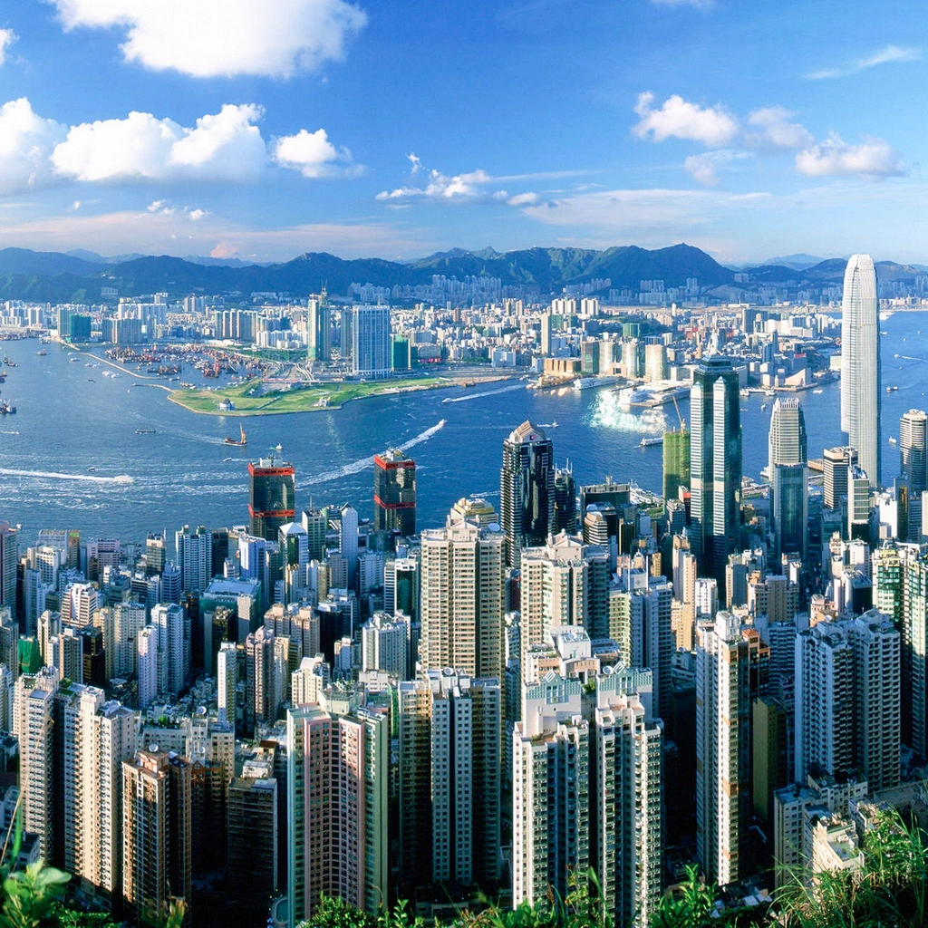 An aerial view over the harbor and city in Hong Kong.